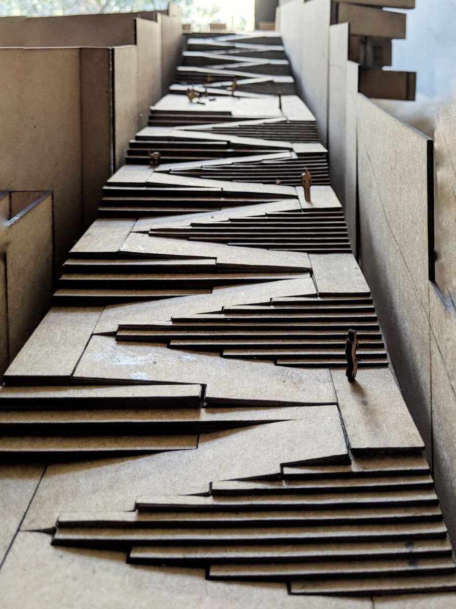 Cardboard study model of the stepped landings and zigzag ramp